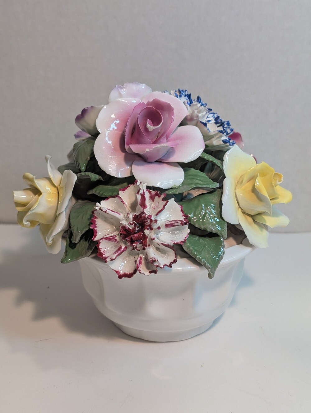Vintage Radnor Bone China Muticolored Flowers In A Footed Planter.